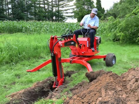 towable backhoe powered by predator